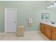 Bathroom featuring vanity and neutral color scheme at 4033 Phoenician Way, Winter Haven, FL 33884