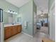 Bathroom featuring vanity and entry to the bedroom at 4033 Phoenician Way, Winter Haven, FL 33884