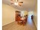 Dining room with wood floors features access to living areas, creating an open and inviting atmosphere at 4152 Limerick Dr, Lake Wales, FL 33859