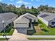 Inviting single Gathering home featuring manicured lawn and landscaping at 428 Lake Suzanne Dr, Lake Wales, FL 33859
