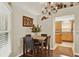 Eat-in kitchen dining area with a chandelier and hardwood flooring at 428 Lake Suzanne Dr, Lake Wales, FL 33859