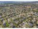 Aerial view showcasing a single-Gathering home's location at 452 Palastro Ave, Auburndale, FL 33823