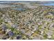 Aerial view showing home's location in a residential neighborhood at 452 Palastro Ave, Auburndale, FL 33823