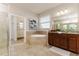 Spacious Primary bathroom with soaking tub, walk-in shower, and double vanity at 452 Palastro Ave, Auburndale, FL 33823