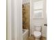 Small bathroom with shower/tub combo and updated fixtures at 452 Palastro Ave, Auburndale, FL 33823