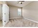 Well lit bedroom with carpet flooring and ceiling fan at 452 Palastro Ave, Auburndale, FL 33823