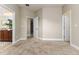 Spacious bedroom with carpet flooring and access to bathroom at 452 Palastro Ave, Auburndale, FL 33823