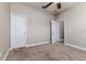 Spacious bedroom with neutral walls and carpet flooring at 452 Palastro Ave, Auburndale, FL 33823