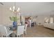 Open concept dining room with a view of the kitchen and living room at 452 Palastro Ave, Auburndale, FL 33823