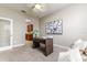 Bright home office features built-in desk and access to adjacent room at 452 Palastro Ave, Auburndale, FL 33823