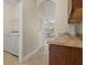 Laundry room with washer, dryer, and overhead shelving at 452 Palastro Ave, Auburndale, FL 33823