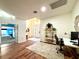 Spacious home office with sleek desk, shelving, and natural light, creating a productive workspace at 4540 Turnberry Ln, Lake Wales, FL 33859