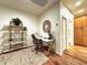 Bright home office featuring a modern desk, stylish shelves, and wood floors for a productive work setting at 4540 Turnberry Ln, Lake Wales, FL 33859