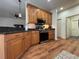 Functional kitchen with stainless steel appliances, stylish cabinetry, and modern lighting at 4540 Turnberry Ln, Lake Wales, FL 33859