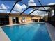 Enclosed pool area offering a private retreat with seating and clear blue water at 4540 Turnberry Ln, Lake Wales, FL 33859