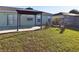 Backyard featuring a patio, gazebo, and fire pit area, creating an inviting outdoor space for gatherings at 4639 Great Blue Heron Dr, Lakeland, FL 33812