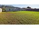 Expansive backyard with lush lawn, patio, and gazebo, ideal for outdoor activities and relaxation at 4639 Great Blue Heron Dr, Lakeland, FL 33812