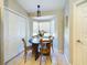 Breakfast nook with a round table, bay windows and storage at 4639 Great Blue Heron Dr, Lakeland, FL 33812