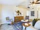Comfortable living room with vaulted ceiling, chairs and stylish decor at 4639 Great Blue Heron Dr, Lakeland, FL 33812