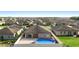 Aerial view of a fenced backyard with an above-ground pool and covered patio at 4924 Saint James St, Winter Haven, FL 33881