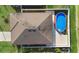 Aerial view of backyard, above ground pool and neighboring houses at 4924 Saint James St, Winter Haven, FL 33881