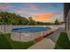 Backyard view of an above-ground pool with ample deck space at 4924 Saint James St, Winter Haven, FL 33881