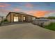 Backyard with large concrete patio and pool at 4924 Saint James St, Winter Haven, FL 33881