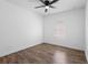 Bright bedroom featuring hardwood floors and a ceiling fan at 4924 Saint James St, Winter Haven, FL 33881