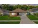 Inviting home featuring a manicured lawn and extra-long driveway at 4924 Saint James St, Winter Haven, FL 33881