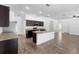 Modern kitchen with stainless steel appliances, granite countertops, and a center island at 4924 Saint James St, Winter Haven, FL 33881