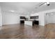 Modern kitchen with stainless steel appliances, granite countertops, and a center island at 4924 Saint James St, Winter Haven, FL 33881