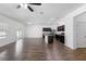 Open-concept living room with a modern kitchen and view to the outdoor area at 4924 Saint James St, Winter Haven, FL 33881