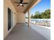 Covered patio with fan and above-ground pool at 4924 Saint James St, Winter Haven, FL 33881