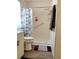 Bathroom featuring a step-in shower with safety bars and leaf-patterned curtain at 6059 Southern Oaks Se Dr, Winter Haven, FL 33884