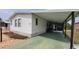 Attractive single-story home showcasing a convenient carport, golf cart, and clean exterior at 6059 Southern Oaks Se Dr, Winter Haven, FL 33884