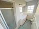Bathroom with tiled floor, shower, and vanity at 618 Chester Dr, Lakeland, FL 33803