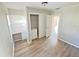 Bedroom featuring a built-in desk, shelving, and hardwood flooring at 618 Chester Dr, Lakeland, FL 33803