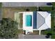 Birds eye view of community pool, surrounded by lush greenery and recreational areas, creating a vibrant outdoor space at 720 Fonda Ct # 54, Lakeland, FL 33803