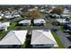A beautiful community aerial featuring well-maintained homes and landscaping with mature trees at 720 Fonda Ct # 54, Lakeland, FL 33803