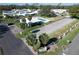 Aerial view of a vibrant community featuring a pool, clubhouse, and lush landscaping at 720 Fonda Ct # 54, Lakeland, FL 33803