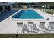 A beautiful community pool with crystal-clear water, ready for residents to enjoy swimming and lounging by the poolside at 720 Fonda Ct # 54, Lakeland, FL 33803