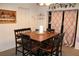 This dining room features a wooden table with black chairs, perfect for intimate dinners and Gathering gatherings at 807 S 1St St, Lake Wales, FL 33853