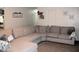 Relaxing living area featuring a large sectional sofa and tasteful decor, perfect for comfortable living at 807 S 1St St, Lake Wales, FL 33853