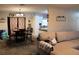 Open floor plan with cozy living room with eat-in kitchen, perfect for entertaining guests and casual Gathering meals at 807 S 1St St, Lake Wales, FL 33853