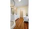 Bright bathroom featuring a clawfoot tub, step-in shower, and dual vanity sinks at 907 Vistabula St, Lakeland, FL 33801