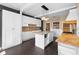 Bright kitchen with white cabinets, center island, stone countertop, and wooden countertops at 907 Vistabula St, Lakeland, FL 33801