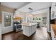 Open kitchen featuring an island, modern appliances, and plenty of natural light at 907 Vistabula St, Lakeland, FL 33801