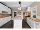 Eat-in kitchen with an island, custom cabinetry, and stainless steel appliances at 907 Vistabula St, Lakeland, FL 33801