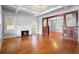 Living room with a decorative fireplace and hardwood floors at 907 Vistabula St, Lakeland, FL 33801