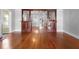 Spacious living room features hardwood floors, decorative columns, and an open layout at 907 Vistabula St, Lakeland, FL 33801